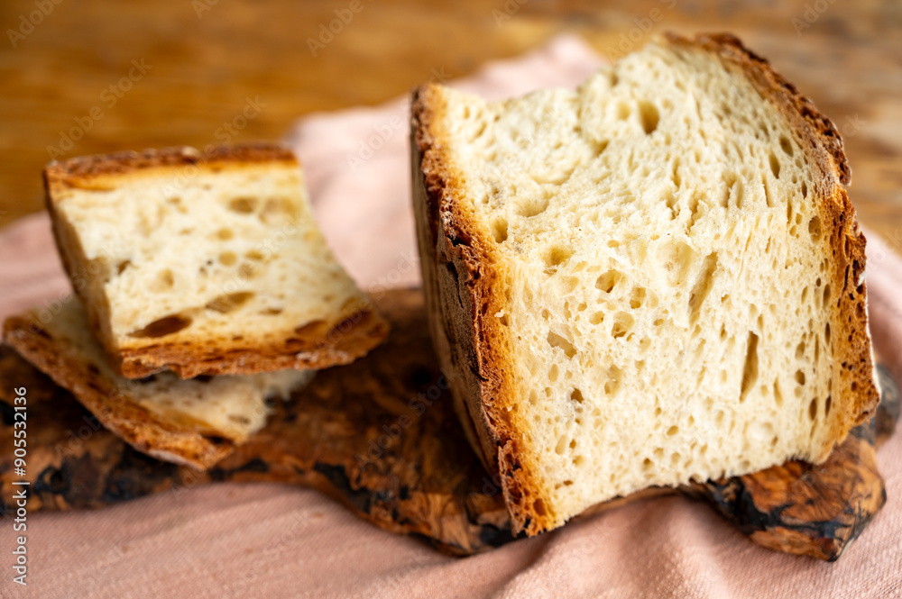 Freshly baked big sourdough traditional italian bread on olive wood fired oven Freshly baked big sourdough traditional italian bread on olive wood fired oven