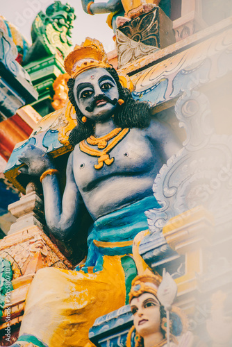 Colorful statue of Hindu God on the temple in Sri Lanka. photo