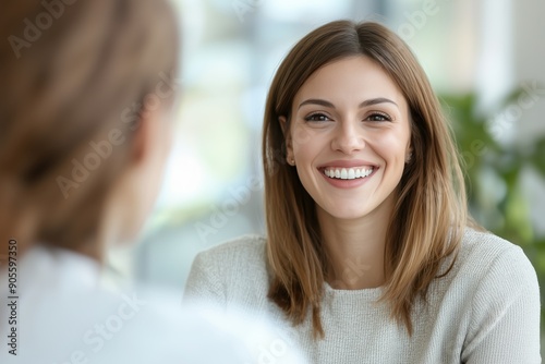 Free Download Smiling Female Manager Interviewing an Applicant In Office	
 - GFXLoad