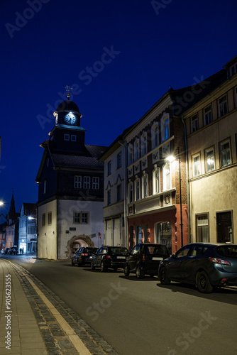 Obraz na płótnie Street alley in the small town of Schwabisch Hall, with houses and buildings with typical German architecture and street lanterns, at night. w salonie