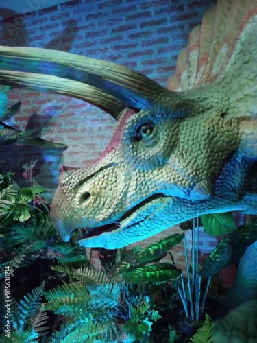 Mechatronic dinosaur with forest decoration around it