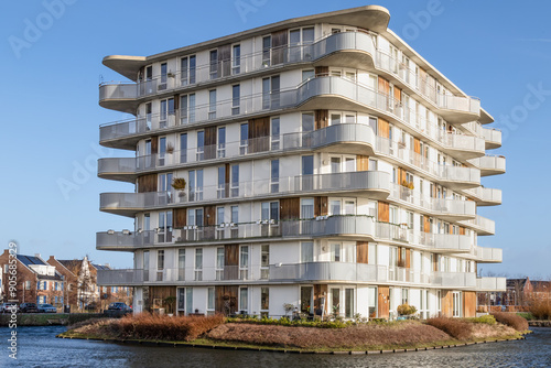 New residential block built in a pond in the new Vathorst district in Amersfoort.