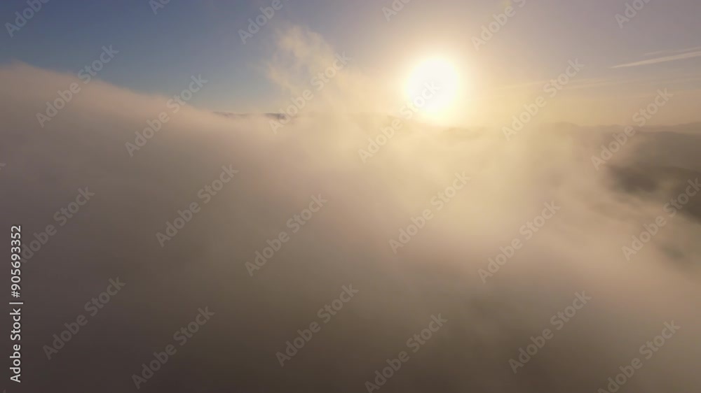 Explore the stunning beauty of Malibu, California from a captivating aerial view. A cinematic 4K shot shows a mystical scene of fog meeting the rising sun, captured by an FPV drone Explore the stunning beauty of Malibu, California from a captivating aerial view. A cinematic 4K shot shows a mystical scene of fog meeting the rising sun, captured by an FPV drone