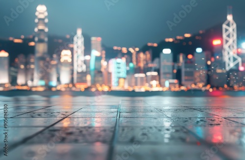 Nighttime Cityscape With Reflections on Wet Pavement in Hong Kong