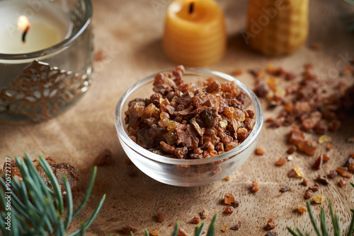 Canvas Print A bowl of myrrh resin on a table - ingredient for essential oils