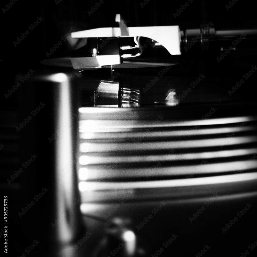 Artistic black and white closeup of a needle on a record player Artistic black and white closeup of a needle on a record player