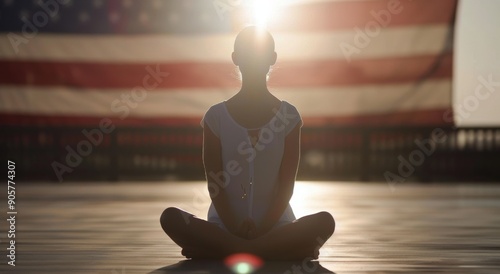 Hand Holding Sparkler Against American Flag During Celebration