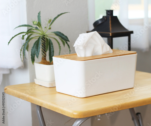 wooden tissue box on wooden table