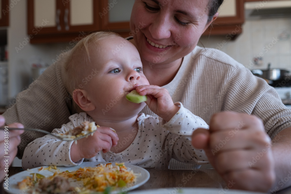 Mother feeding child. Healthy nutrition for children. Mother feeding child. Healthy nutrition for children.