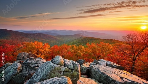 sunset view from grayobbled rock in the shenandoah national park overlooking valley with colorful trees and distant mountains #905834161