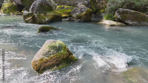 日本の風景 緑色の渓流と、苔のむした立派な岩をドローンで空撮 宮崎県の観光地