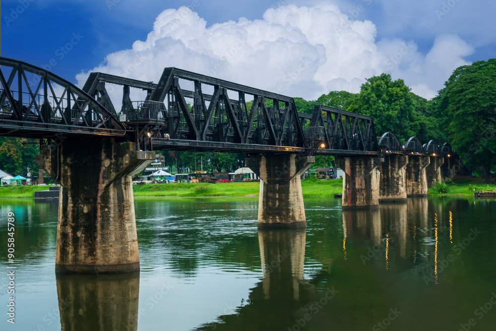 Obraz premium Beautiful landscape of Bridge River Kwai at Kanchanaburi, Thailand in morning time. Is a famous place and a tourist destination