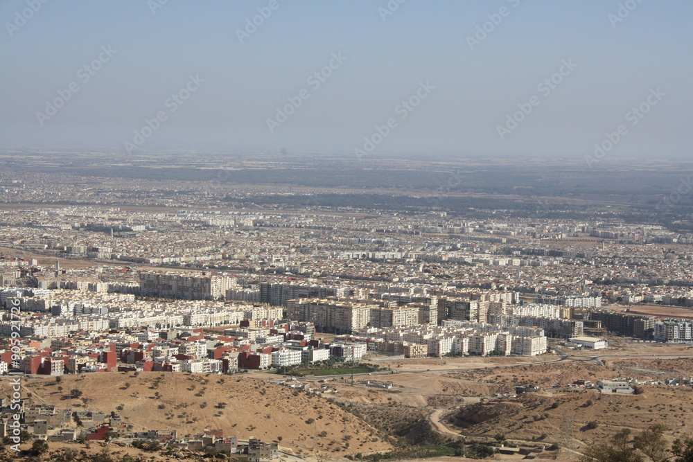 Obraz premium A view of the city of Agadir from the top of the mountain on July 29 2024.