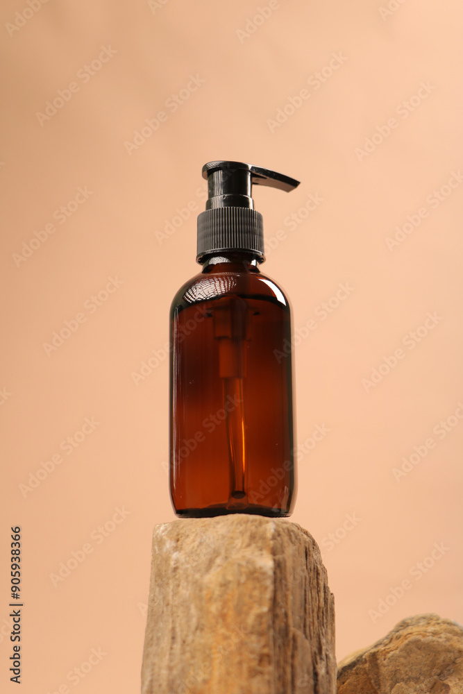 Amber Pump Bottle on Stone for Minimalist Skincare or Soap Dispenser Mockup Amber Pump Bottle on Stone for Minimalist Skincare or Soap Dispenser Mockup
