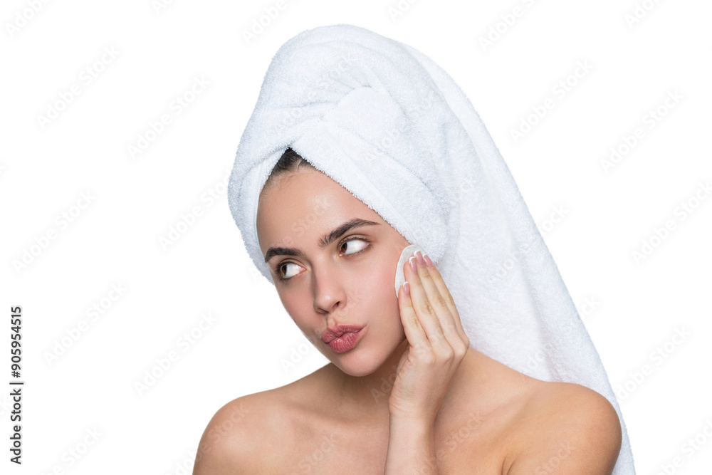 Remove the makeup. Beauty routine. Woman in towel cleaning face skin. Cleansing skin with cotton ball. Skincare cosmetology. Beauty day in spa. Woman use cotton pad. Skincare. Skin rejuvenation Remove the makeup. Beauty routine. Woman in towel cleaning face skin. Cleansing skin with cotton ball. Skincare cosmetology. Beauty day in spa. Woman use cotton pad. Skincare. Skin rejuvenation