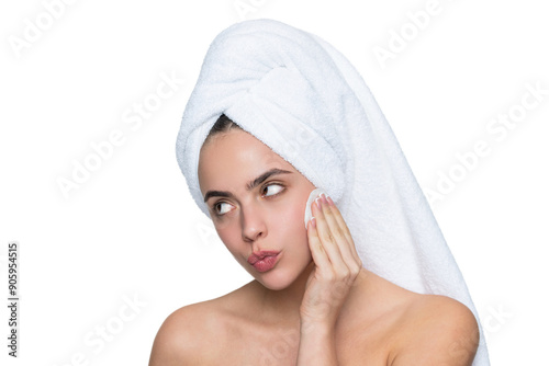 Remove the makeup. Beauty routine. Woman in towel cleaning face skin. Cleansing skin with cotton ball. Skincare cosmetology. Beauty day in spa. Woman use cotton pad. Skincare. Skin rejuvenation