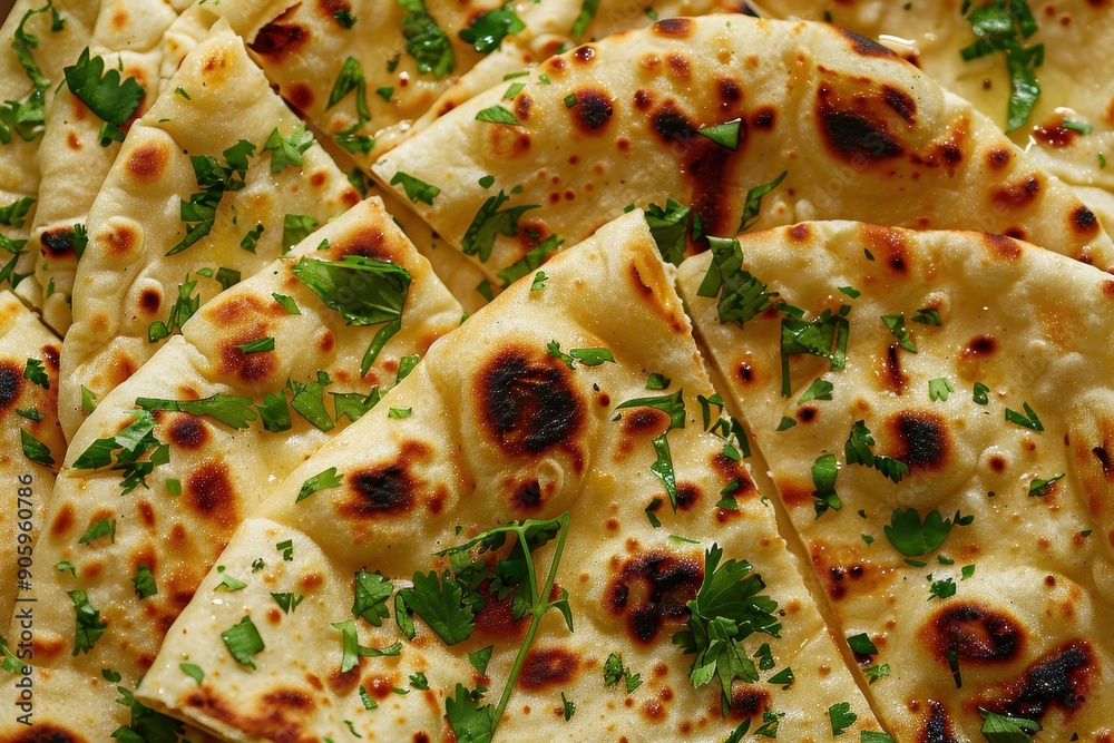 Close-up of Golden Brown Naan Bread with Fresh Parsley Close-up of Golden Brown Naan Bread with Fresh Parsley
