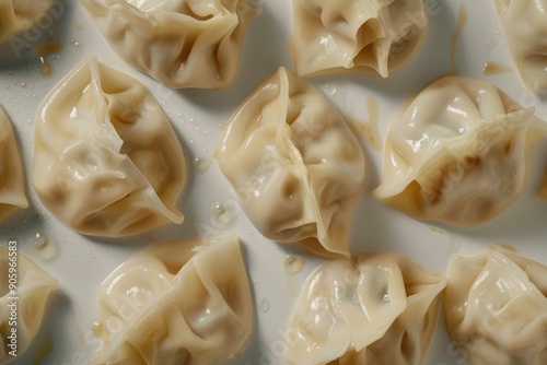 A Close-Up View of Steamed Dumplings on a White Plate