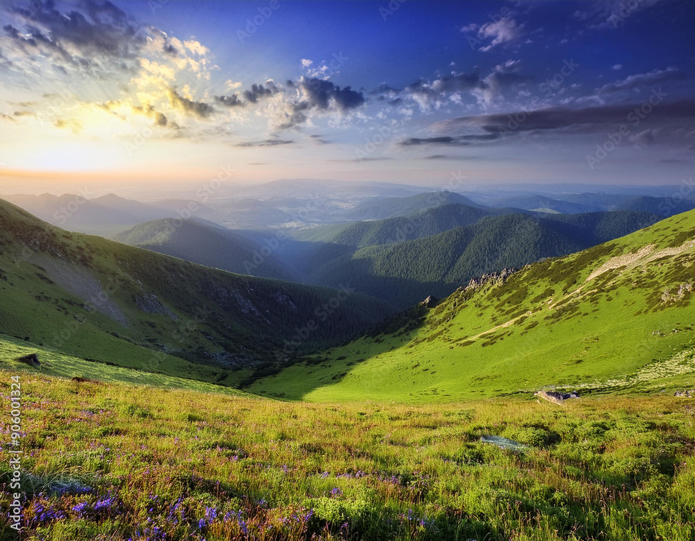 Fototapeta premium Scenic Landscape Overlooking Majestic Mountains, Featuring Rolling Hills and Expansive Vistas, Ideal for Nature, Travel, and Adventure-Themed Photography and Artwork