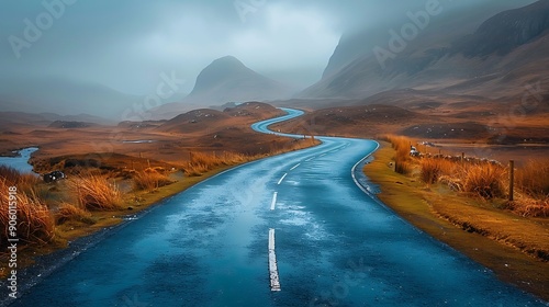 road winding through the Scottish Highlands photo