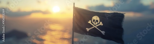 Pirate flag with skull and crossbones waving in sunset sky photo