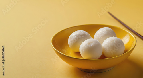 Mochi. Mochi or Mochi is a Japanese sweetmeat made from glutinous rice and sugar. photo
