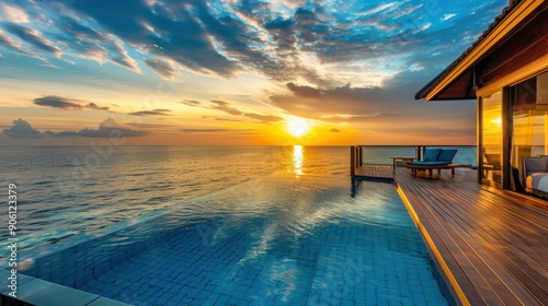 Sunset Over The Ocean With Infinity Pool