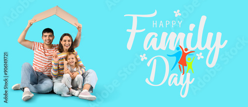 Happy family with cardboard...