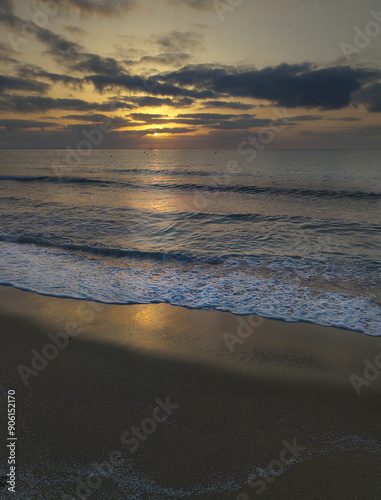 sunset on the beach urbanova on Alicante in Spain.