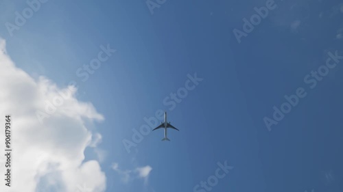 A plane's overhead flight. The beauty of a plane in the sky.