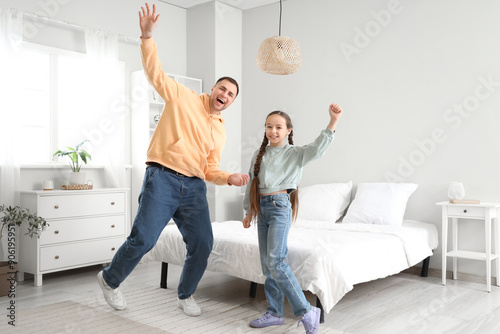 Father and his daughter dan...