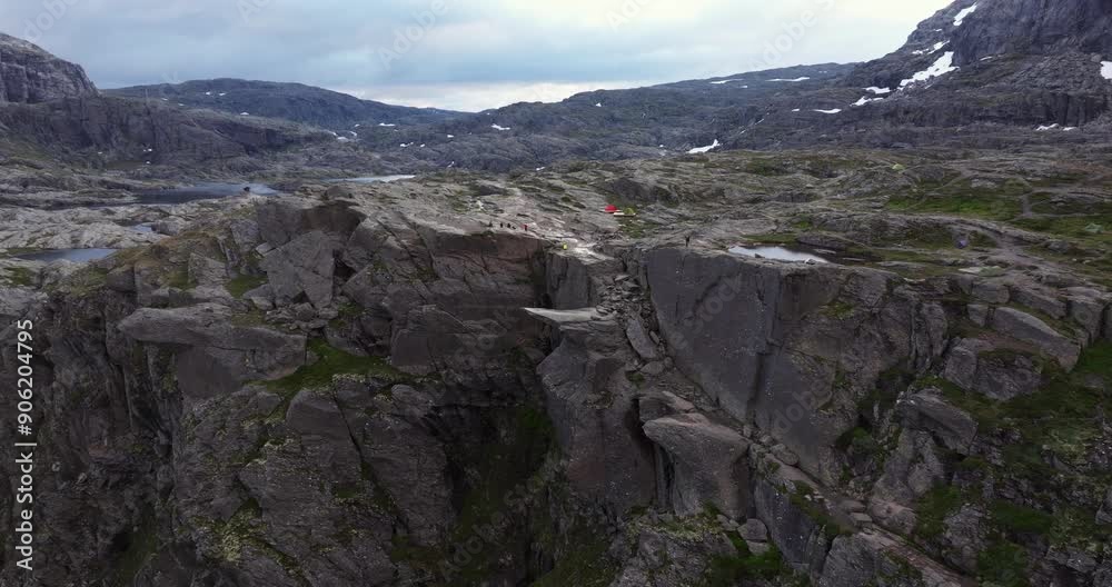 Cinematic Establishing Drone Shot Above Norway's Famous Trolltunga Cliff Cinematic Establishing Drone Shot Above Norway's Famous Trolltunga Cliff