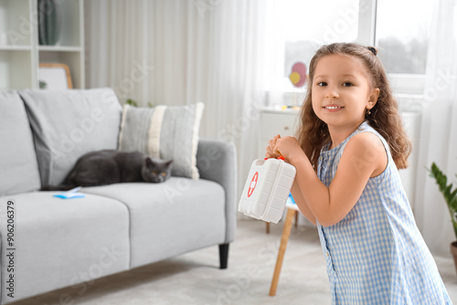 Cute little girl with first...