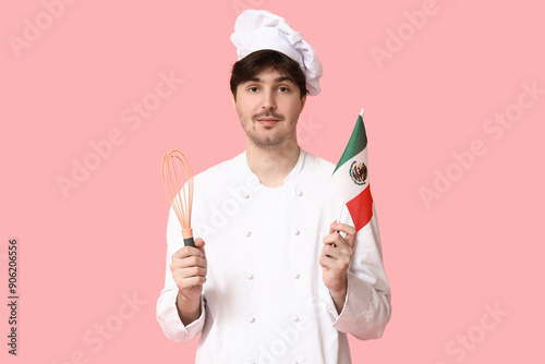 Young male chef with whisk ...