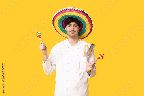 Young male chef with sombre...