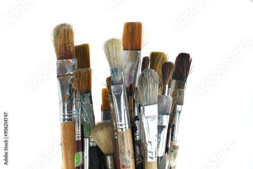 Paintbrushes varying sizes and bristle styles with wooden handles