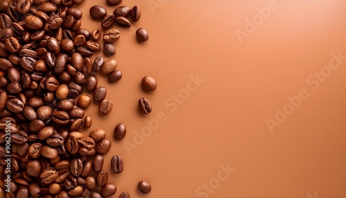 fresh coffee beans on Brown background