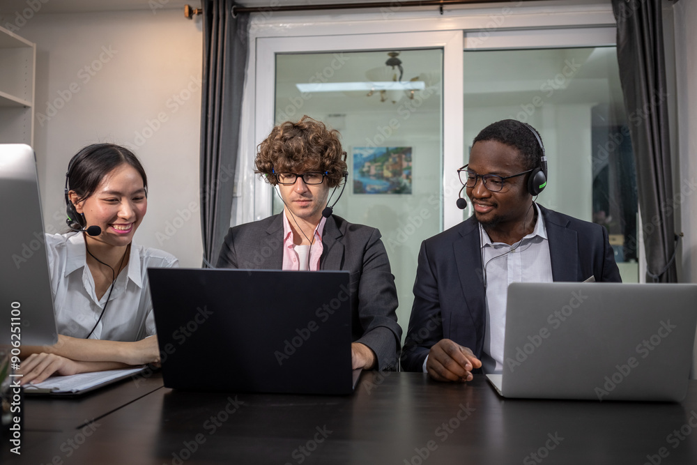 Team multiethnic call center worker and operators with headset and computer at work modern office, support telemarketing. Network operations information customer service. Team multiethnic call center worker and operators with headset and computer at work modern office, support telemarketing. Network operations information customer service.