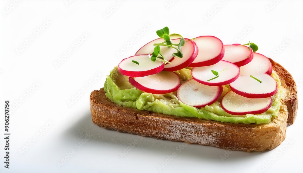 A delicious slice of bread topped with creamy avocado and fresh radish slices, perfect for healthy snacking or breakfast. A delicious slice of bread topped with creamy avocado and fresh radish slices, perfect for healthy snacking or breakfast.