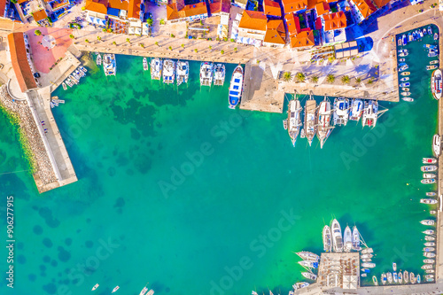 view of the city center and marina in Jelsa town, summer scenery in Croatia, Dalmartia region photo