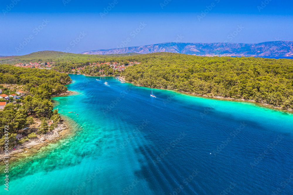 Fototapeta premium Scenic view of marble tourist resort Vrboska, deep marina coastline.