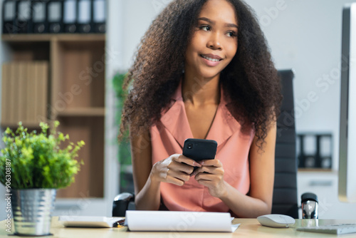 Email notification concept, Female use smartphone and laptop receive message alert in the mailbox. photo