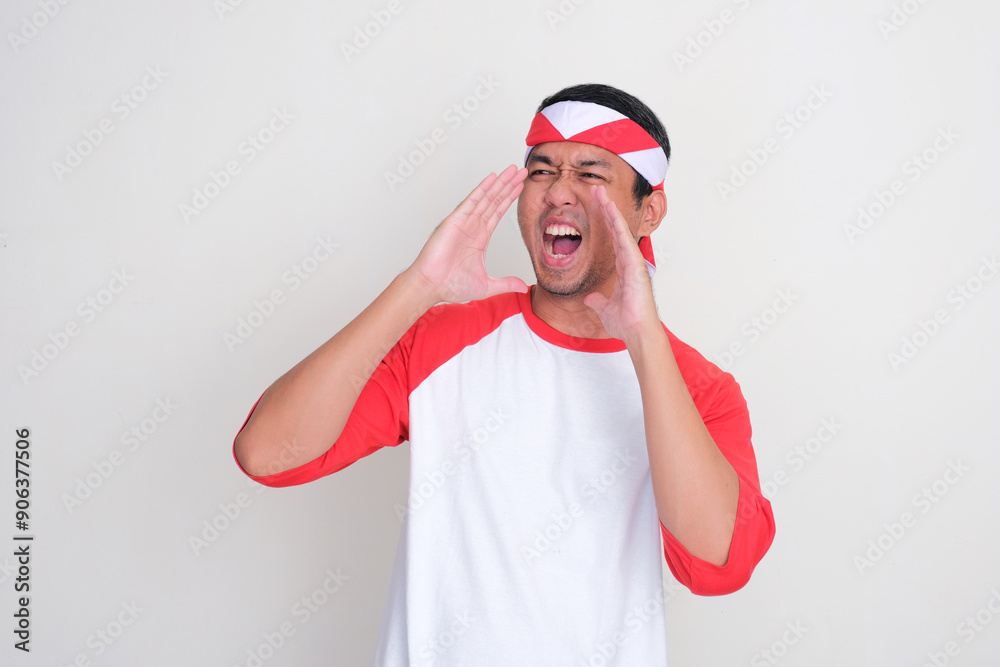 Indonesian man telling something gesture with excited expression Indonesian man telling something gesture with excited expression