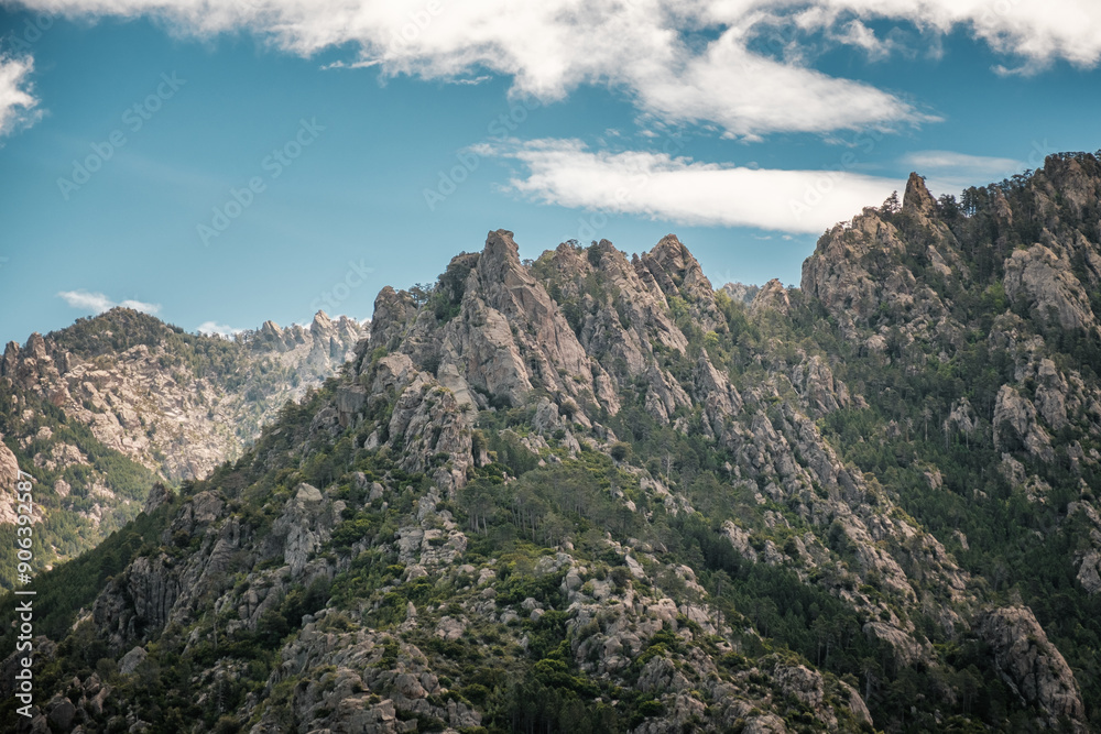 Jagged, rocky, mountain peaks in the interior of the Mediterranean island of Corsica Jagged, rocky, mountain peaks in the interior of the Mediterranean island of Corsica