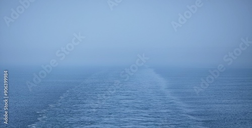 cruise ship trails waves foggy sea water calm misty ocean background