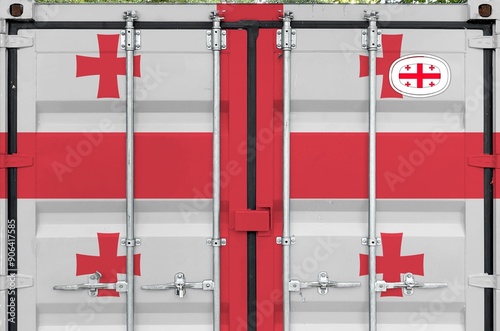 Georgia flag depicted on metal doors of shipping cargo container outdoors in docks area close up photo