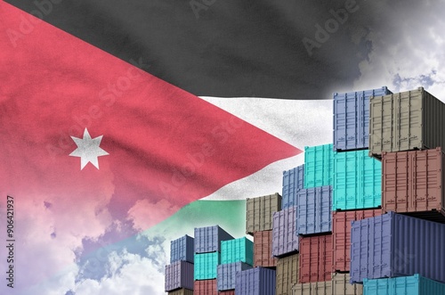 Jordan flag and big stack of shipping cargo containers in docks with sky background close up photo