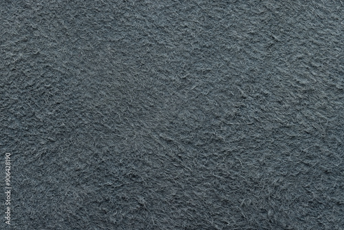 Genuine suede, gray color. Sample background or texture. Studio shot.