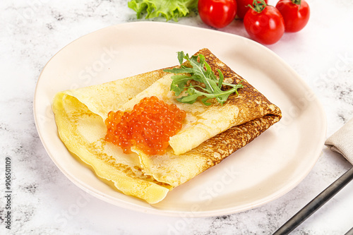 Russian pancake with red caviar