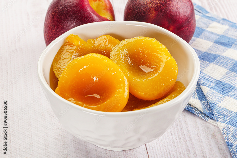 Canned peaches with sweet syrope Canned peaches with sweet syrope